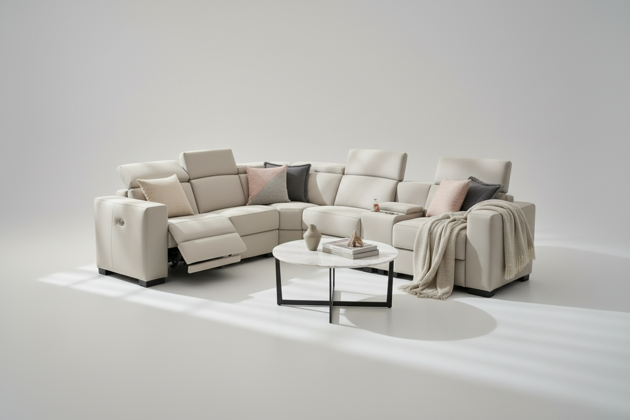 Beige sectional sofa in a living room with sunlight streaming through curtains.