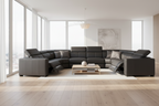 Black leather sectional sofa on a white background