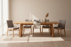 A rectangular dining table made of natural finish wood, accompanied by eight chairs with gray upholstered pewter-colored seats and black metal handles.