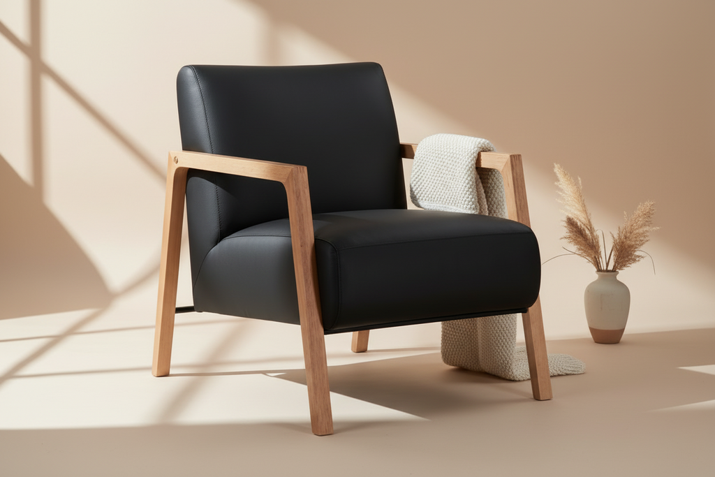 Black armchair with wooden frame on a light gray background